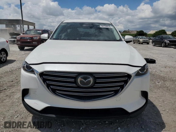 2019 Mazda CX-9 Touring with VIN JM3TCACY7K0327632, listed as a Copart auction lot 60798635 with 63,087 mi miles and Salvage title. Bid and sale history available at DreamBid. Image 5.