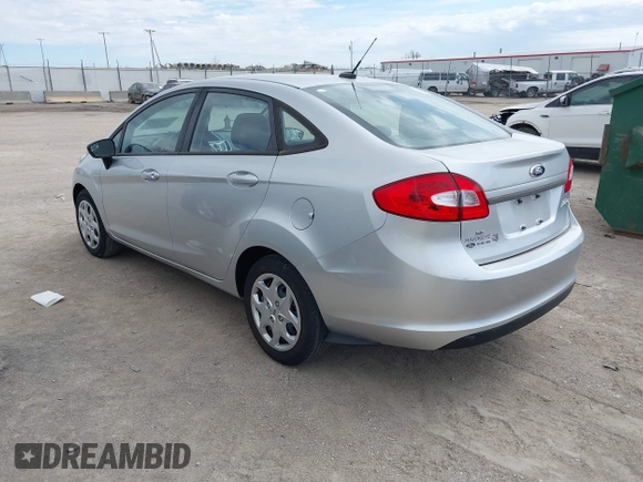 2013 Ford Fiesta SE z VIN 3FADP4BJ3DM207999, wystawiony jako IAAI lot #41880992 z przebiegiem 133 443 mil mil oraz . Historia ofert i sprzedaży dostępna na DreamBid. Obrazek 3.