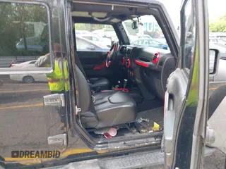 2014 Jeep Wrangler Unlimited Sahara с VIN 1C4BJWEG0EL248401, выставлен на аукционе IAAI как лот 42306970 с пробегом 134 904 миль миль и . История ставок и продаж доступна на DreamBid. Изображение 5.