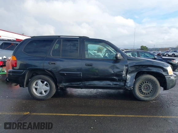 2003 GMC Envoy SLT with VIN 1GKDT13S732283859, listed as a IAAI auction lot 41219105 with 172,953 mi miles. Bid and sale history available at carsss.com. Image 14.