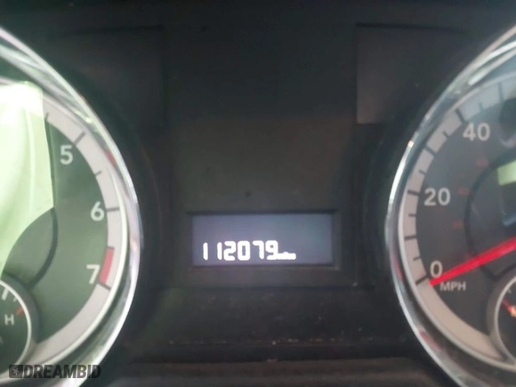 2012 Dodge Grand Caravan SE with VIN 2C4RDGBG0CR157374, listed as a IAAI auction lot 40502846 with 112,079 mi miles. Bid and sale history available at carsss.com. Image 7.
