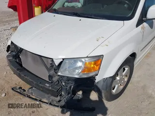 2010 Dodge Grand Caravan SXT with VIN 2D4RN5D1XAR462150, listed as a IAAI auction lot 41466381 with 204,531 mi miles and . Bid and sale history available at DreamBid. Image 14.
