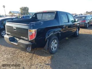 2006 Honda Ridgeline RT with VIN 2HJYK16296H551622, listed as a IAAI auction lot 41852291 with 266,964 mi miles. Bid and sale history available at carsss.com. Image 4.