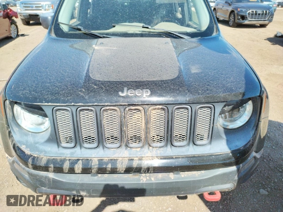2015 Jeep Renegade Trailhawk z VIN ZACCJBCT9FPB21561, wystawiony jako Copart lot #63051673 z przebiegiem Nie podano mil oraz Szkoda całkowita • Salvage title. Historia ofert i sprzedaży dostępna na DreamBid. Obrazek 12.