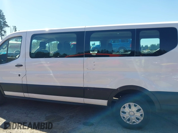 2024 Ford Transit Passenger XL z VIN 1FBAX2Y88RKA11307, wystawiony jako IAAI lot #42620775 z przebiegiem 13 624 mil mil oraz . Historia ofert i sprzedaży dostępna na DreamBid. Obrazek 14.