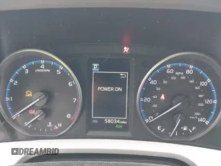2018 Toyota RAV4 XLE with VIN 2T3RFREV5JW811742, listed as a IAAI auction lot 42030276 with 58,034 mi miles. Bid and sale history available at carsss.com. Image 7.