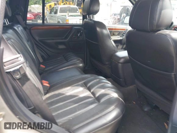 1999 Jeep Grand Cherokee Limited with VIN 1J4GW68N9XC808639, listed as a IAAI auction lot 42521785 with 156,864 mi miles and . Bid and sale history available at DreamBid. Image 8.