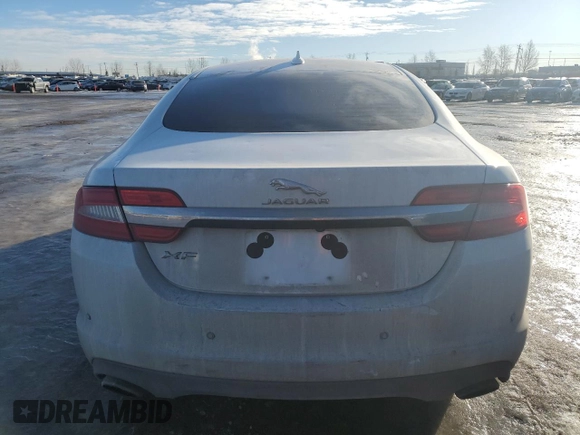2015 Jaguar XF with VIN SAJXA0FS5FPU49437, listed as a Copart auction lot 84757254 with 99,301 mi miles and Salvage Title. Bid and sale history available at DreamBid. Image 6.