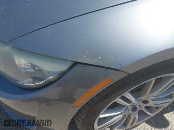 2012 BMW 3 Series 335i with VIN WBAKG7C53CE802941, listed as a IAAI auction lot 42574469 with 125,908 mi miles and . Bid and sale history available at DreamBid. Image 6.