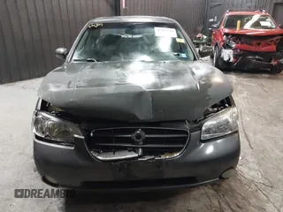 2001 Nissan Maxima SE with VIN JN1CA31A91T112866, listed as a IAAI auction lot 42372546 with 156,069 mi miles and . Bid and sale history available at DreamBid. Image 12.