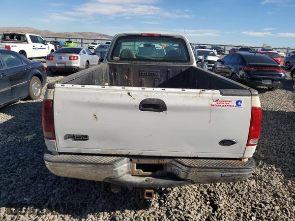1999 Ford F-150 z VIN 1FTRF18W1XKA87801, wystawiony jako Copart lot #79094454 z przebiegiem Nie podano mil oraz Szkoda całkowita • Salvage title. Historia ofert i sprzedaży dostępna na DreamBid. Obrazek 10.