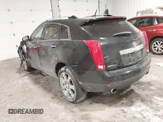 2011 Cadillac SRX Performance Collection with VIN 3GYFNEEY9BS533994, listed as a IAAI auction lot 40990072 with 168,134 mi miles. Bid and sale history available at carsss.com. Image 3.