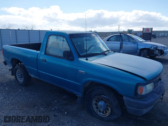 1995 Mazda B-Series Truck z VIN 4F4CR12A0STM09915, wystawiony jako IAAI lot #41773728 z przebiegiem 90 000 mil mil oraz . Historia ofert i sprzedaży dostępna na DreamBid. Obrazek 1.