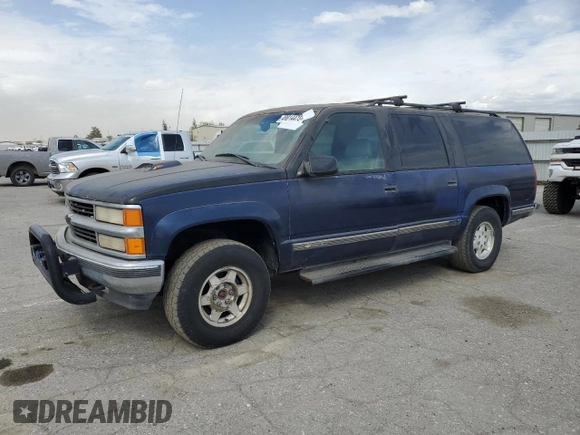 1997 Chevrolet Suburban z VIN 1GNFK16R9VJ309720, wystawiony jako Copart lot #48814475 z przebiegiem 198 109 mil mil oraz Czysty tytuł • Clean title. Historia ofert i sprzedaży dostępna na DreamBid. Obrazek 1.