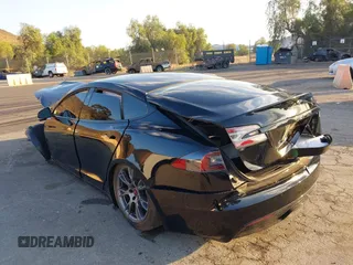 2022 Tesla Model S with VIN 5YJSA1E50NF462647, listed as a IAAI auction lot 41354668 with Not Provided miles and . Bid and sale history available at DreamBid. Image 3.