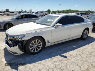 2019 BMW 7 Series 740i xDrive with VIN WBA7E4C56KGV28289, listed as a Copart auction lot 60130574 with 26,000 mi miles and Salvage Title. Bid and sale history available at carsss.com. Image 1.