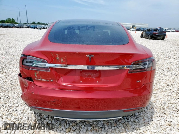 2014 Tesla Model S 60 with VIN 5YJSA1H18EFP38582, listed as a Copart auction lot 56581735 with 69,106 mi miles and Salvage title. Bid and sale history available at DreamBid. Image 6.
