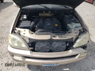 2002 Mercedes-Benz M-Class with VIN 4JGAB54E72A322046, listed as a Copart auction lot 74393084 with 128,015 mi miles and Salvage Title. Bid and sale history available at carsss.com. Image 12.