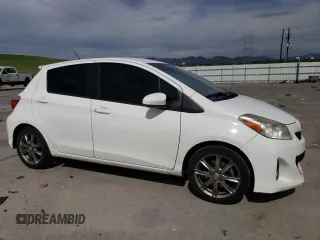 2012 Toyota Yaris L z VIN JTDKTUD3XCD528749, wystawiony jako Copart lot #56803205 z przebiegiem 140 024 mil mil oraz Szkoda całkowita • Salvage title. Historia ofert i sprzedaży dostępna na DreamBid. Obrazek 4.