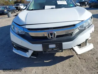 2018 Honda Civic Sedan EX-T with VIN JHMFC1F35JX020163, listed as a IAAI auction lot 41338015 with 86,079 mi miles. Bid and sale history available at carsss.com. Image 21.
