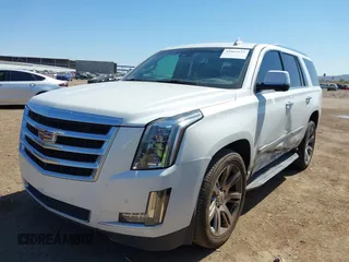 2016 Cadillac Escalade Luxury Collection z VIN 1GYS3BKJ2GR427147, wystawiony jako IAAI lot #41863121 z przebiegiem 104 459 mil mil oraz . Historia ofert i sprzedaży dostępna na DreamBid. Obrazek 2.