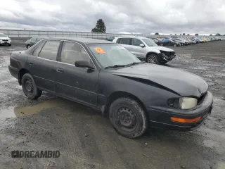 1994 Toyota Camry LE with VIN JT2SK12E7R0192153, listed as a Copart auction lot 48637655 with 366,629 mi miles and Salvage Title. Bid and sale history available at carsss.com. Image 4.