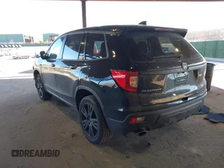 2021 Honda Passport Sport with VIN 5FNYF8H27MB021098, listed as a IAAI auction lot 41333241 with 101,239 mi miles and . Bid and sale history available at DreamBid. Image 3.