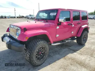 2013 Jeep Wrangler Unlimited Moab with VIN 1C4BJWEG0DL621029, listed as a Copart auction lot 52145835 with 148,882 mi miles and Salvage title. Bid and sale history available at DreamBid. Image 1.