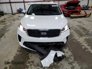 2019 Kia Sorento LX z VIN 5XYPG4A56KG558427, wystawiony jako Copart lot #51971055 z przebiegiem 103 523 mil mil oraz Szkoda całkowita • Salvage title. Historia ofert i sprzedaży dostępna na DreamBid. Obrazek 5.