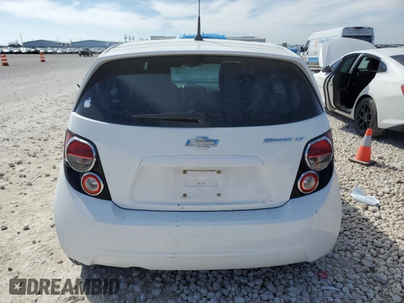 2014 Chevrolet Sonic LT with VIN 1G1JC6SGXE4117408, listed as a Copart auction lot 46913395 with 88,799 mi miles and Salvage Title. Bid and sale history available at carsss.com. Image 6.