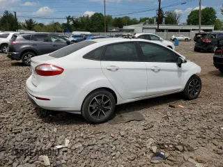 2016 Ford Fiesta SE z VIN 3FADP4BJ9GM105143, wystawiony jako Copart lot #55535655 z przebiegiem 106 599 mil mil oraz Czysty tytuł • Clean title. Historia ofert i sprzedaży dostępna na DreamBid. Obrazek 3.