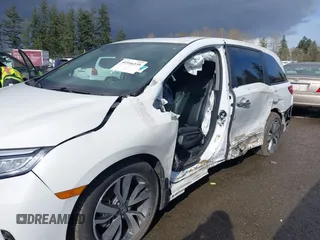 2021 Honda Odyssey Touring with VIN 5FNRL6H87MB015310, listed as a IAAI auction lot 41916339 with 58,808 mi miles. Bid and sale history available at carsss.com. Image 6.