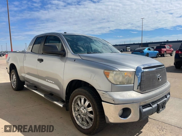 2012 Toyota Tundra z VIN 5TFRM5F10CX040423, wystawiony jako Copart lot #63373535 z przebiegiem 258 090 mil mil oraz Czysty tytuł • Clean title. Historia ofert i sprzedaży dostępna na DreamBid. Obrazek 1.