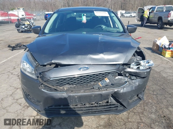 2018 Ford Focus SE with VIN 1FADP3F25JL306401, listed as a IAAI auction lot 41914390 with 84,106 mi miles. Bid and sale history available at carsss.com. Image 13.