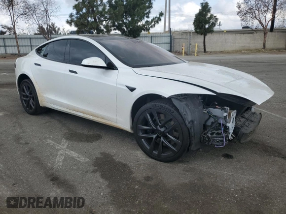 2022 Tesla Model S with VIN 5YJSA1E53NF492855, listed as a Copart auction lot 54545185 with 62,856 mi miles and Salvage title. Bid and sale history available at DreamBid. Image 4.