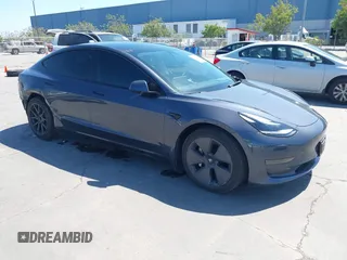 2023 Tesla Model 3 with VIN 5YJ3E1EAXPF405588, listed as a IAAI auction lot 42348952 with 30,788 mi miles and . Bid and sale history available at DreamBid. Image 1.