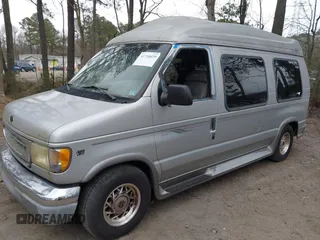 2002 Ford Econoline Cargo with VIN 1FDRE14W72HB82339, listed as a IAAI auction lot 41730429 with 214,165 mi miles and . Bid and sale history available at DreamBid. Image 2.