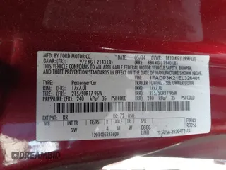 2014 Ford Focus SE z VIN 1FADP3K21EL326401, wystawiony jako IAAI lot #42261913 z przebiegiem 104 717 mil mil oraz . Historia ofert i sprzedaży dostępna na DreamBid. Obrazek 9.