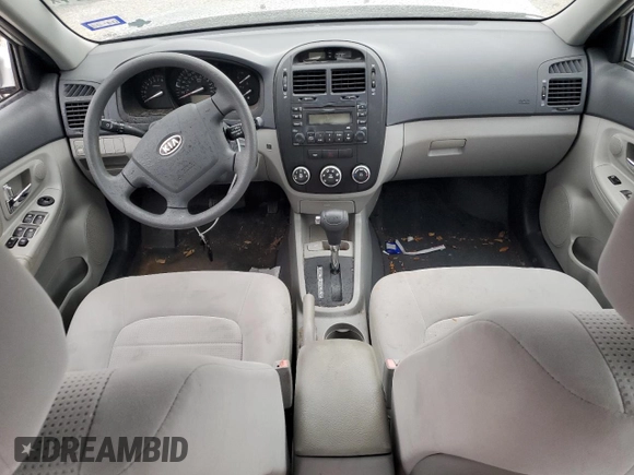 2009 Kia Spectra SX with VIN KNAFE221195656606, listed as a Copart auction lot 84694524 with Not Provided miles and Salvage Title. Bid and sale history available at carsss.com. Image 8.