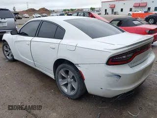 2016 Dodge Charger SE with VIN 2C3CDXBG3GH143507, listed as a IAAI auction lot 41951262 with 210,295 mi miles and . Bid and sale history available at carsss.com. Image 3.