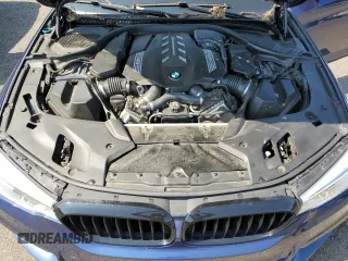 2020 BMW 5 Series M550i xDrive with VIN WBAJS7C0XLBN96338, listed as a Copart auction lot 60591815 with 73,910 mi miles and Salvage title. Bid and sale history available at DreamBid. Image 11.