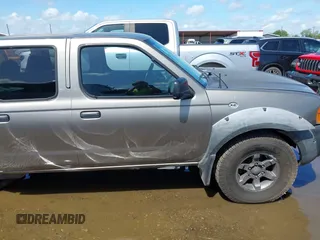 2003 Nissan Frontier XE with VIN 1N6ED29X73C424295, listed as a IAAI auction lot 42622922 with 200,599 mi miles and . Bid and sale history available at DreamBid. Image 14.