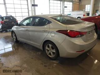 2016 Hyundai Elantra SE with VIN 5NPDH4AE2GH746460, listed as a IAAI auction lot 41571025 with 124,984 mi miles. Bid and sale history available at carsss.com. Image 3.