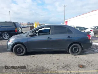 2010 Toyota Yaris with VIN JTDBT4K37A4068398, listed as a IAAI auction lot 40915313 with 123,222 mi miles. Bid and sale history available at carsss.com. Image 13.