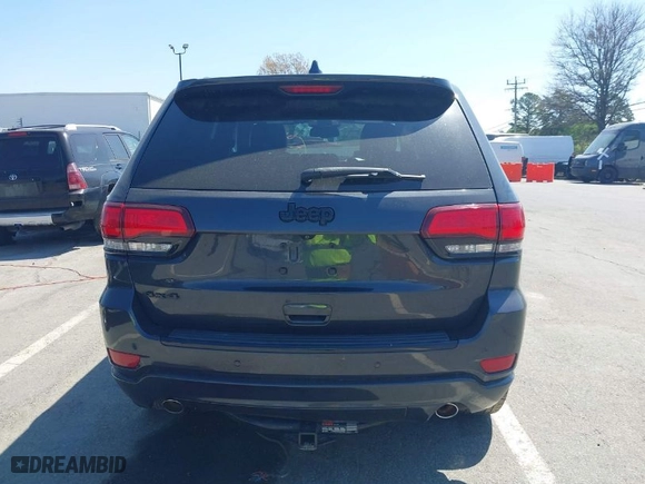2015 Jeep Grand Cherokee Altitude with VIN 1C4RJFAG8FC954649, listed as a IAAI auction lot 41906591 with 76,804 mi miles. Bid and sale history available at carsss.com. Image 16.