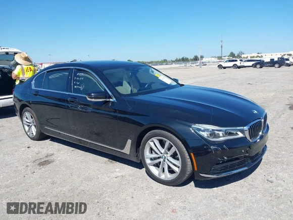 2018 BMW 7 Series 750i with VIN WBA7F0C54JGM22900, listed as a IAAI auction lot 41673673 with 66,264 mi miles. Bid and sale history available at carsss.com. Image 1.