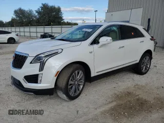 2024 Cadillac XT5 FWD Premium Luxury with VIN 1GYKNCRSXRZ745180, listed as a Copart auction lot 87627615 with 6,753 mi miles and Salvage Title. Bid and sale history available at carsss.com. Image 1.