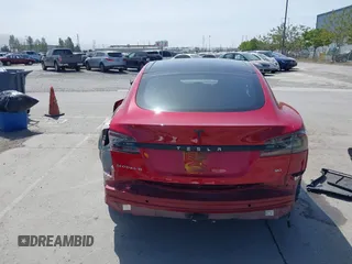 2016 Tesla Model S 70 with VIN 5YJSA1E17GF152401, listed as a IAAI auction lot 42272384 with 65,698 mi miles and . Bid and sale history available at DreamBid. Image 6.