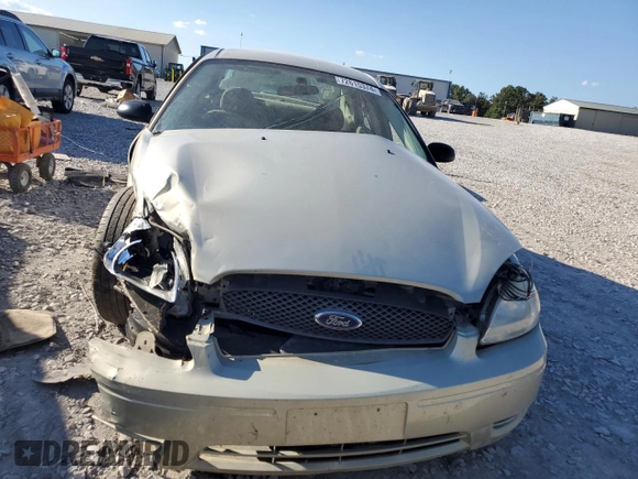 2006 Ford Taurus SE с VIN 1FAFP53U76A221489, выставлен на аукционе Copart как лот 72615374 с пробегом Не указан миль и Списание • Salvage title. История ставок и продаж доступна на DreamBid. Изображение 5.