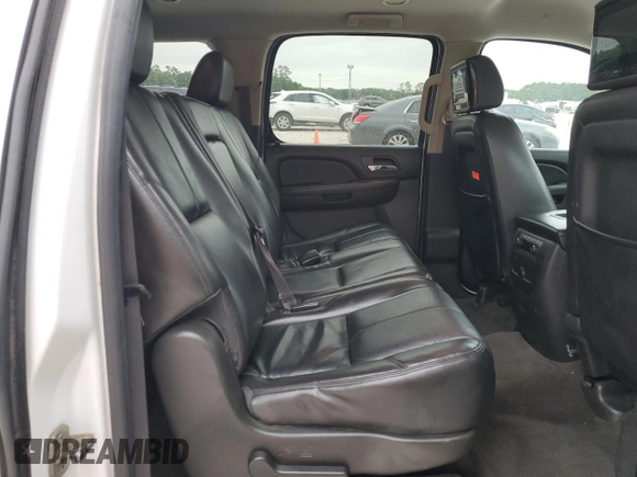 2012 Chevrolet Suburban LT с VIN 1GNSCJE09CR234272, выставлен на аукционе Copart как лот 55577005 с пробегом 118 796 миль миль и Списание • Salvage title. История ставок и продаж доступна на DreamBid. Изображение 11.